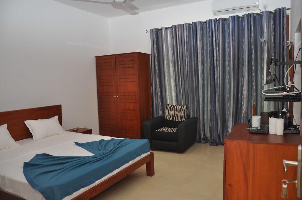 Aarya Hotel Pinnawala Kamer foto