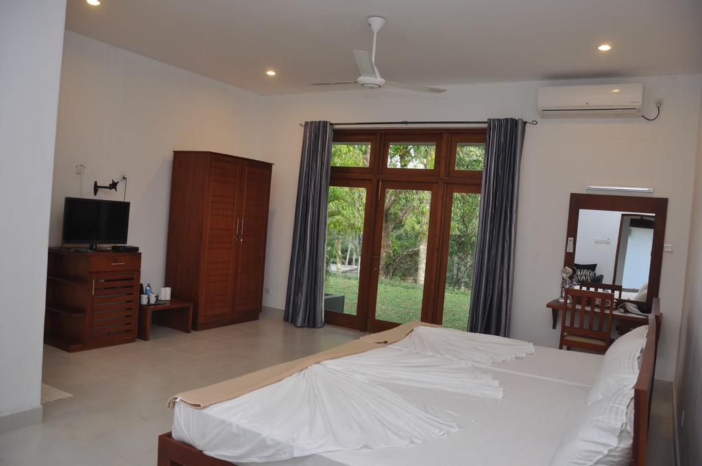 Aarya Hotel Pinnawala Kamer foto