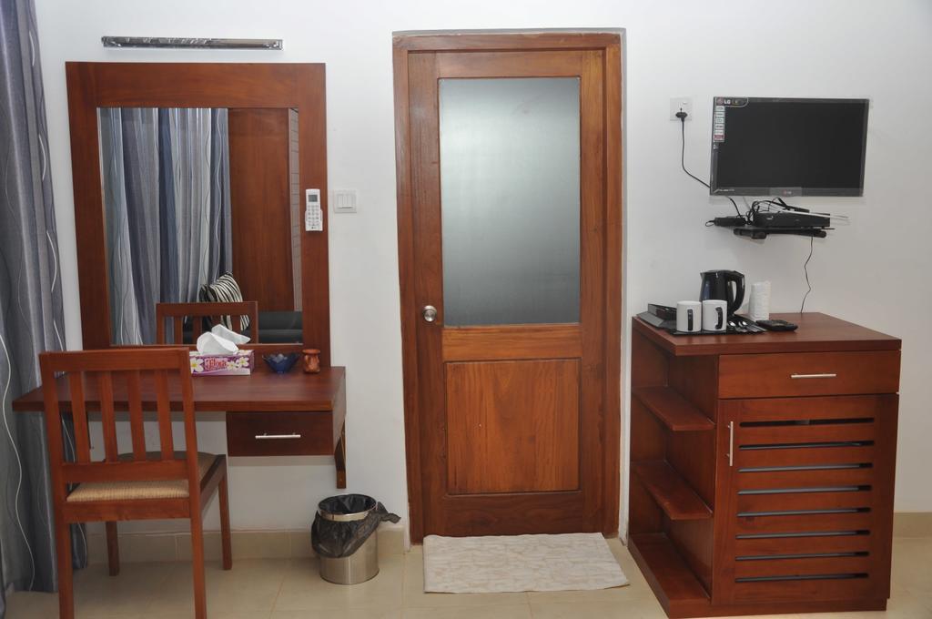 Aarya Hotel Pinnawala Kamer foto